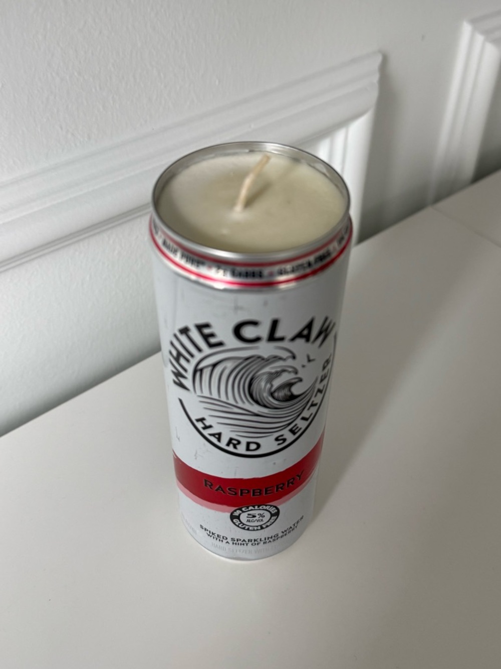 White Claw Raspberry Candle - White with Red Accent